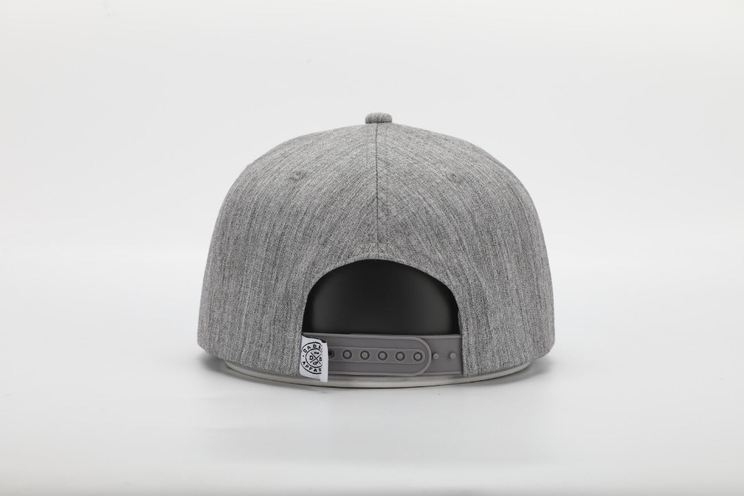 Heather grey Dad Vibes hat with brown leather patch and adjustable snapback.