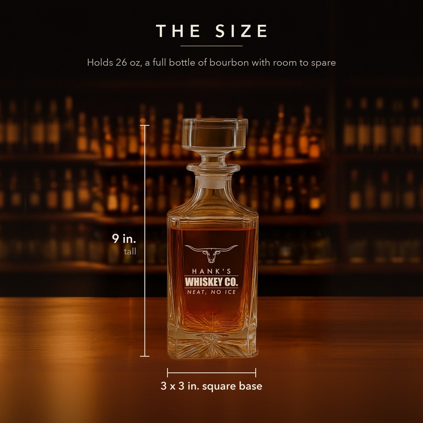 Size guide for the engraved whiskey decanter: 9 inches tall with a 3 by 3 inch square base, holds 26 oz, shown engraved Hank's Whiskey Co., Neat, No Ice