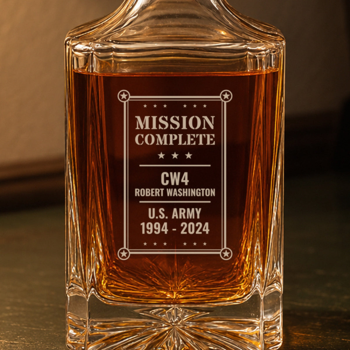 Close-up of the frosted engraving: Mission Complete, CW4 Robert Washington, U.S. Army, 1994 to 2024, inside a star-cornered frame