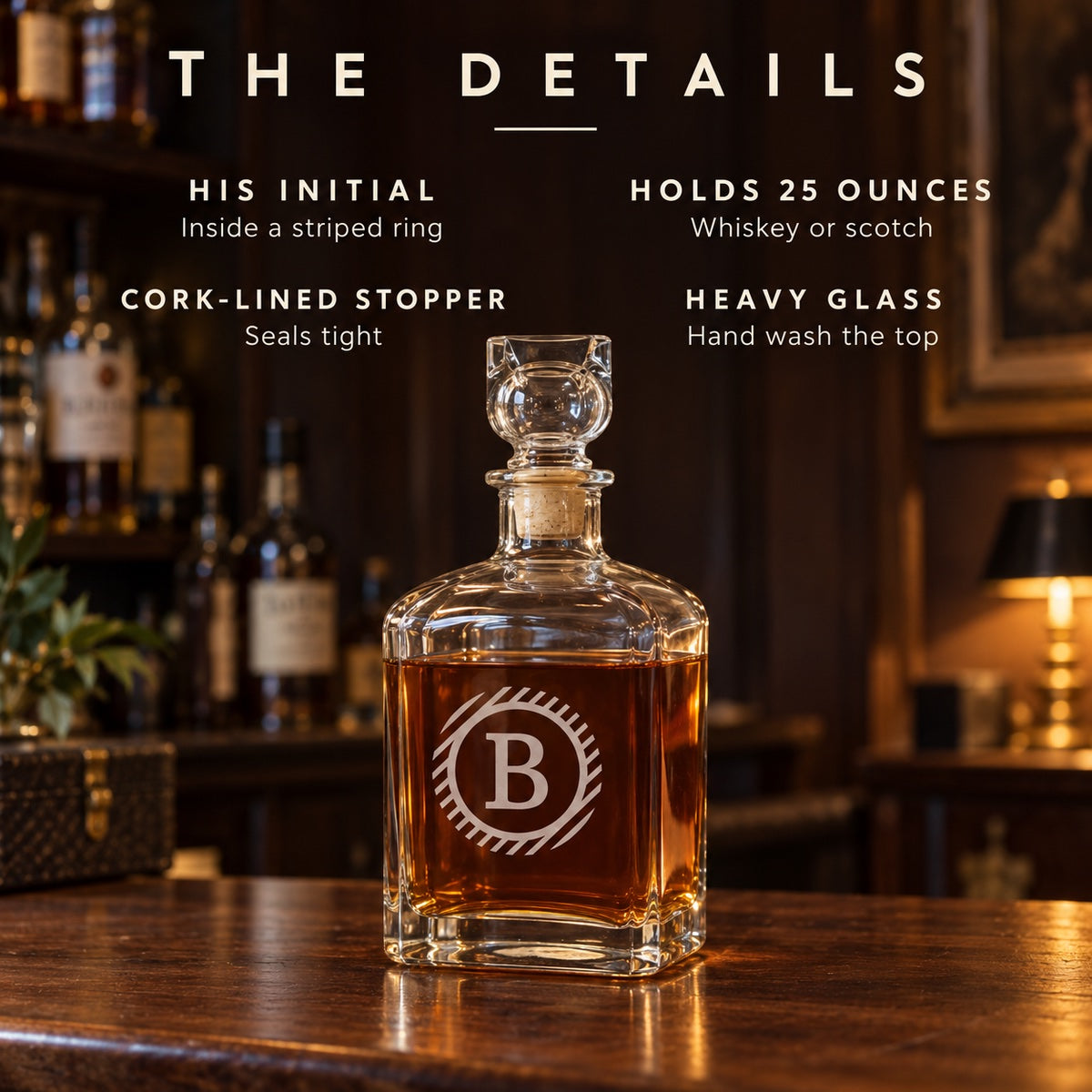 Details of the monogrammed scotch decanter etched B: his initial inside a striped ring, holds 25 ounces, cork-lined stopper, heavy glass
