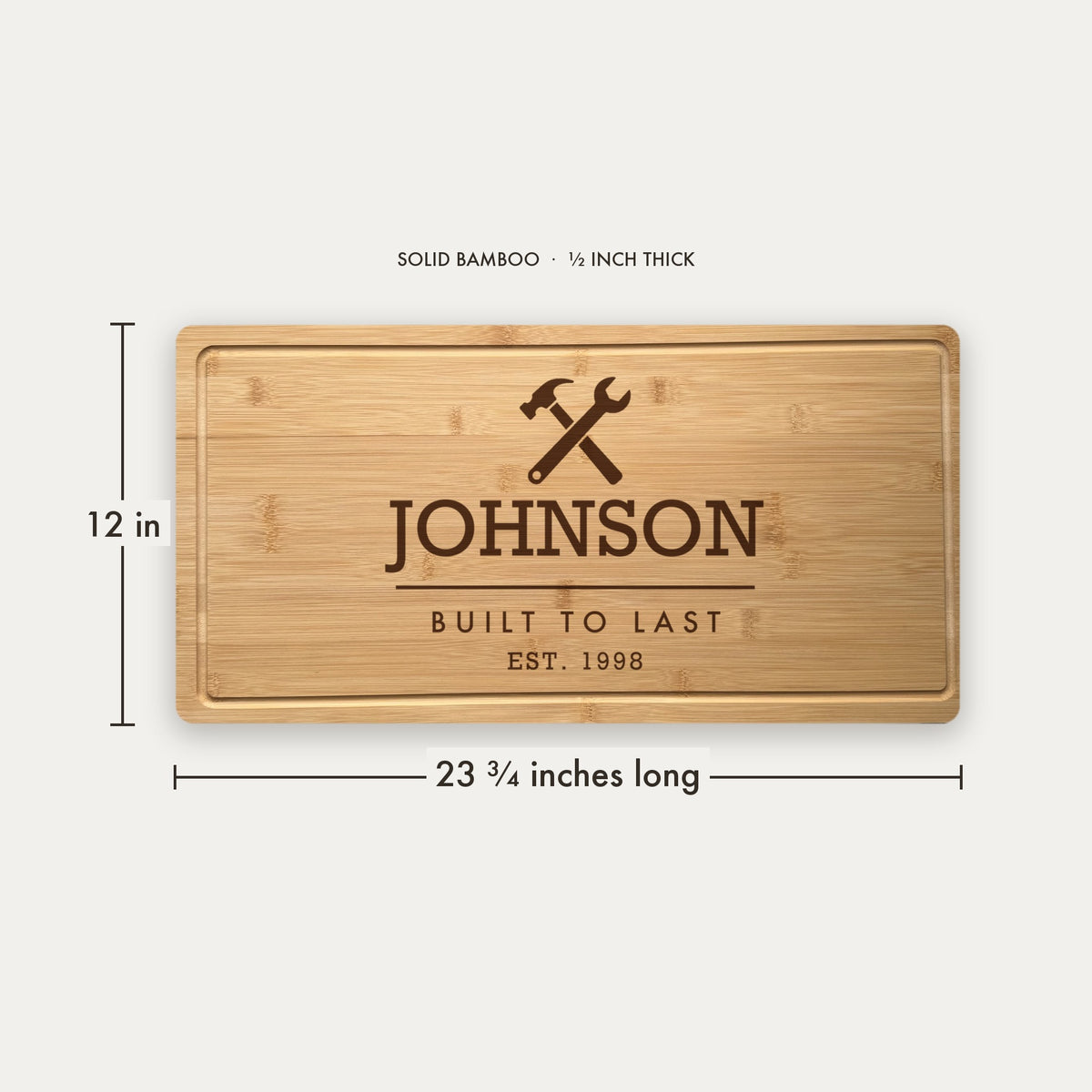 Size guide for the personalized blue collar cutting board, 23 and three quarter inches long by 12 inches wide in half inch thick solid bamboo.
