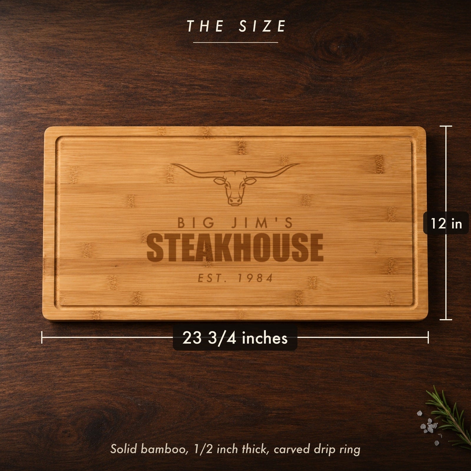 Size of the personalized steakhouse cutting board for dad, 23 3/4 inches long by 12 inches wide in half inch bamboo, engraved BIG JIM'S STEAKHOUSE