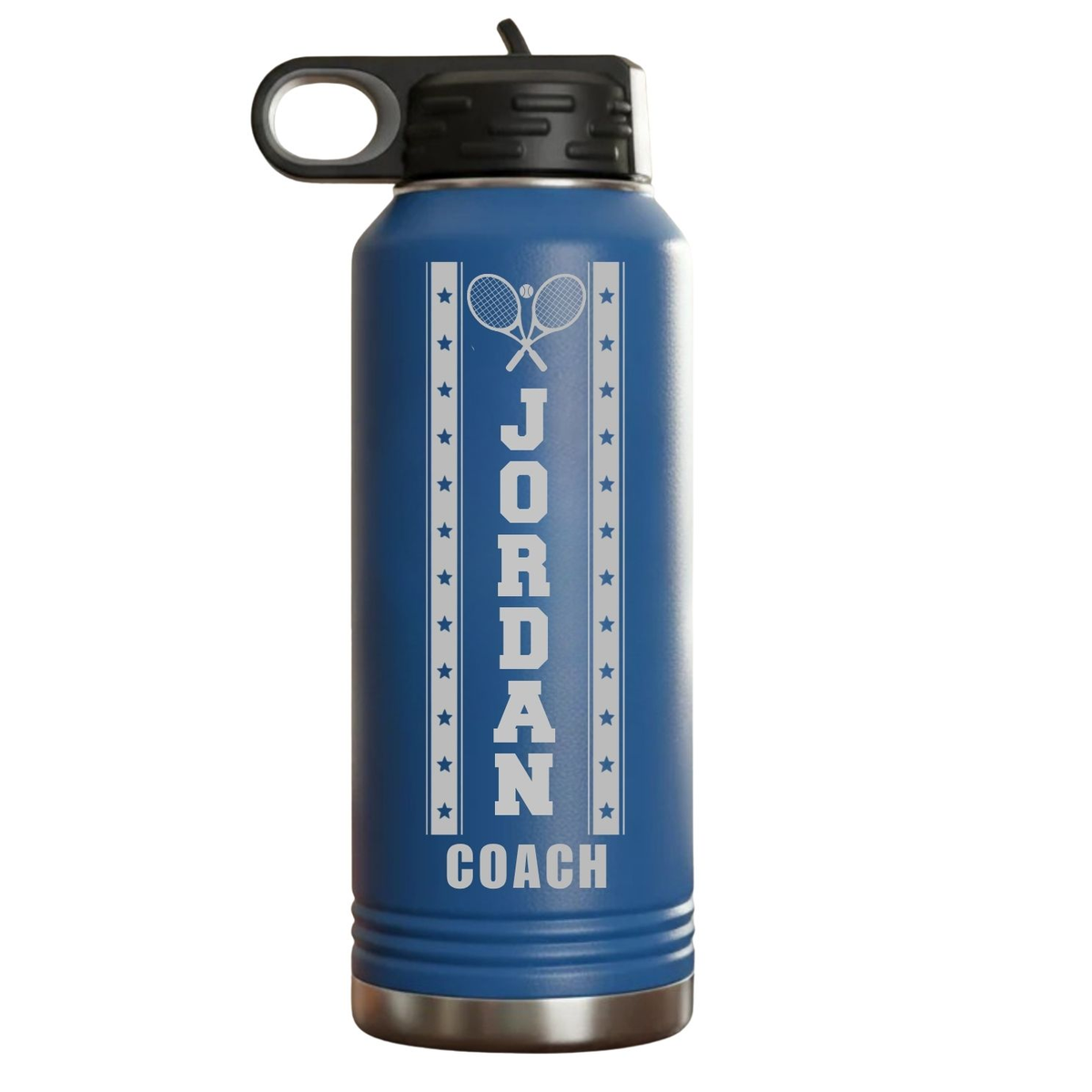 Blue personalized tennis coach water bottle engraved with sample name JORDAN and the word COACH in a crossed tennis rackets star-banner design