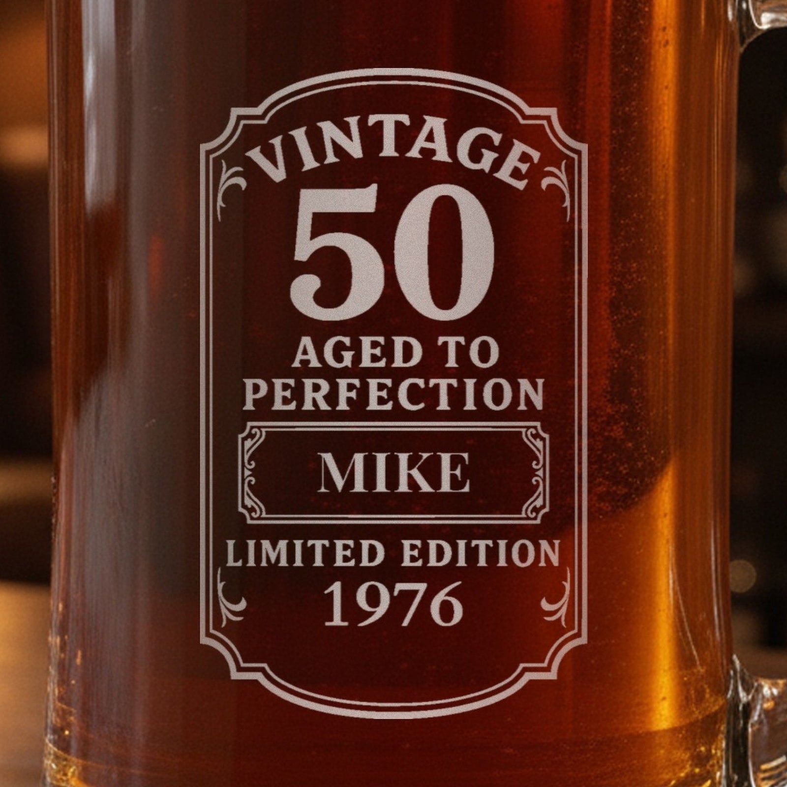 Close-up of the frosted laser engraving on the 50th birthday beer stein: Vintage 50, Aged to Perfection, Mike, Limited Edition 1976