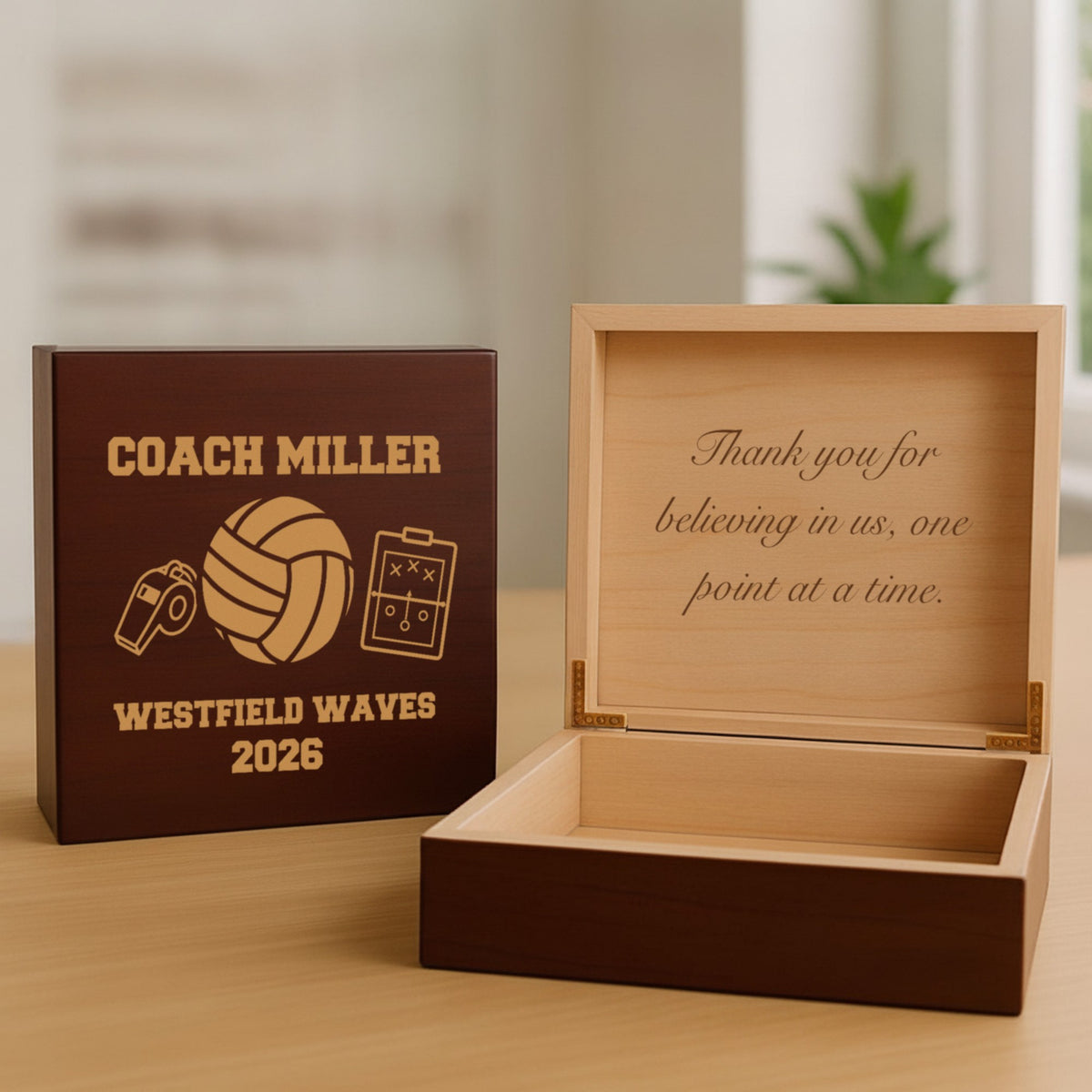 Cherry volleyball coach keepsake box with engraved lid beside the open box, the inside lid engraved Thank you for believing in us, one point at a time