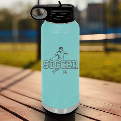 Teal Soccer Water Bottle With Dynamic Player On The Pitch Design