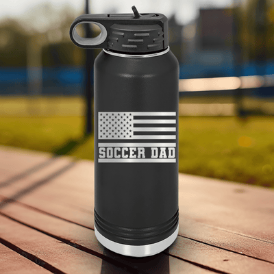 Black Soccer Water Bottle With Flag Waving Soccer Enthusiast Design