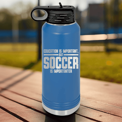 Blue Soccer Water Bottle With Soccer Is Most Important Design