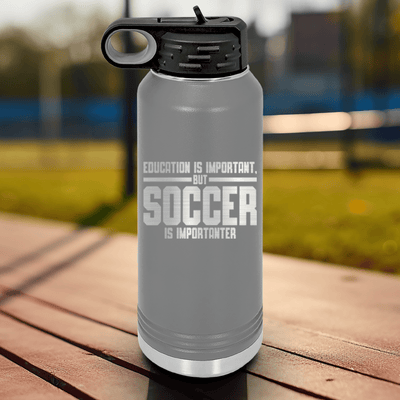 Grey Soccer Water Bottle With Soccer Is Most Important Design