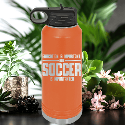 Orange Soccer Water Bottle With Soccer Is Most Important Design