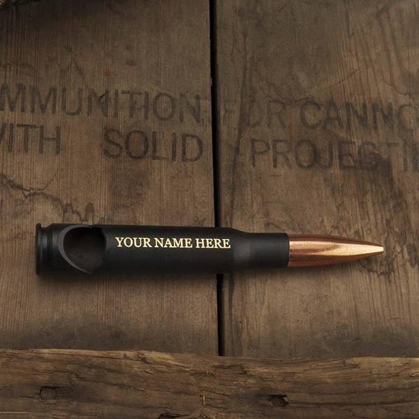 Bullet Bottle Opener against wood boards