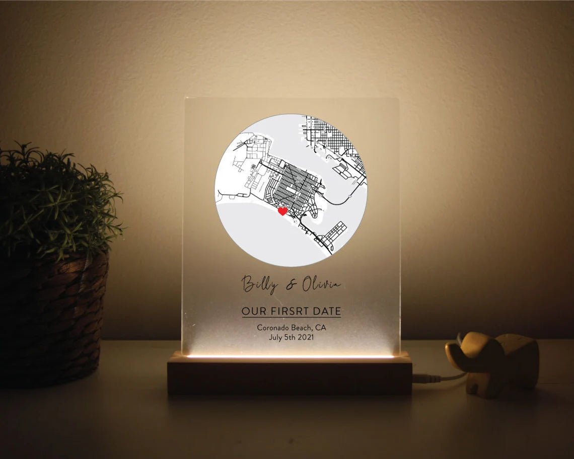 Romantic map sign personalized with custom coordinates, names, and date, available in wood or acrylic with optional LED light stand – perfect for Valentine’s Day, anniversaries, or weddings