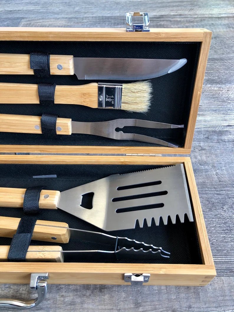 Personalized BBQ grilling tool set with spatula, tongs, fork, and more in a bamboo case