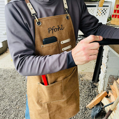 Personalized apron with items in pockets