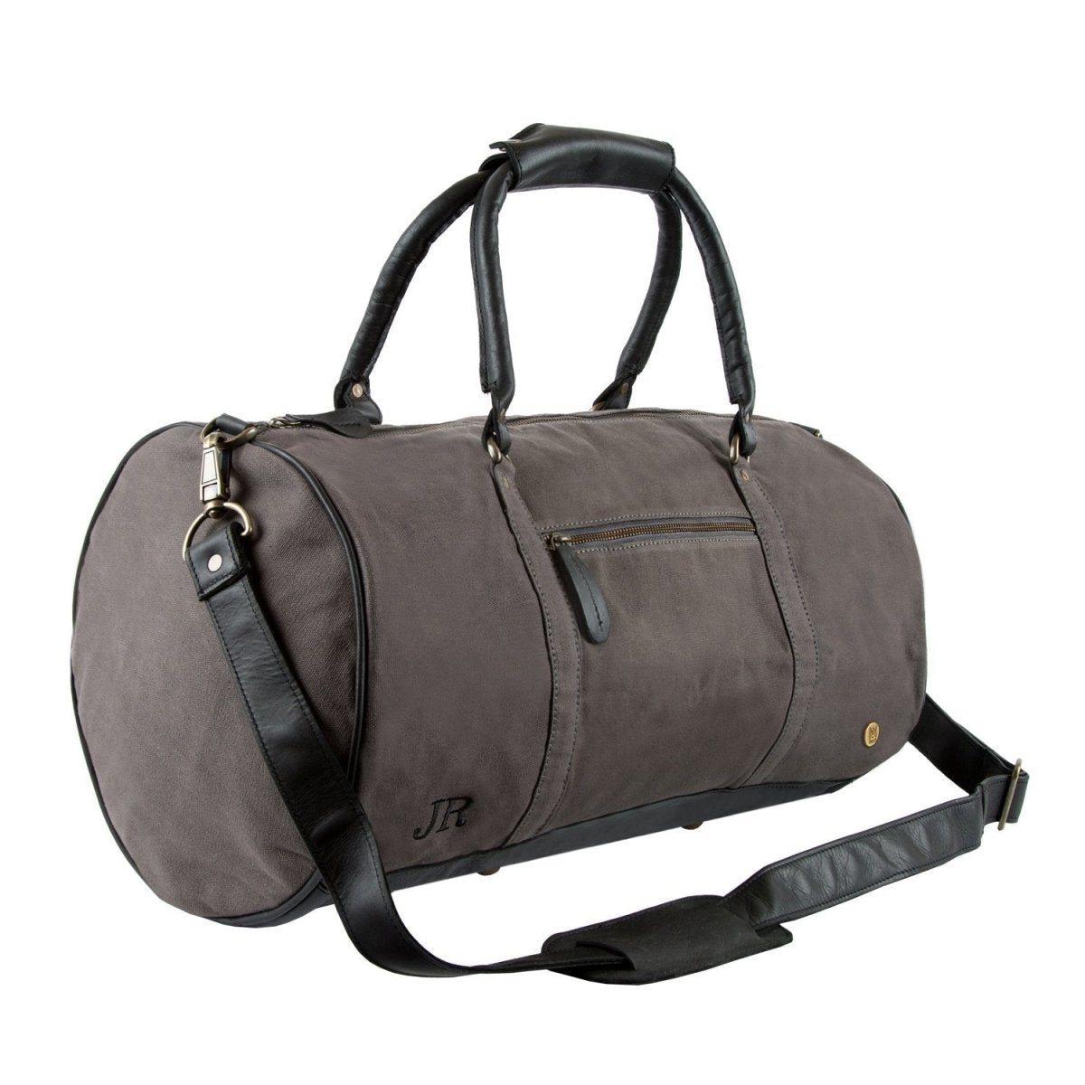 Grey waxed canvas gym duffle for men at a three quarter angle, the initials JR embroidered in black on the lower front, with a black leather base and strap