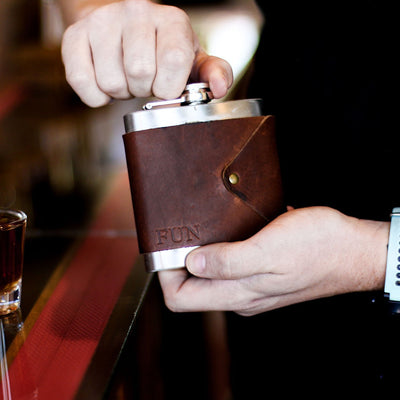Metal Flask With Engraved Brown Leather Wrapping